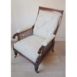 Rare antique William IV mahogany framed reclining library armchair