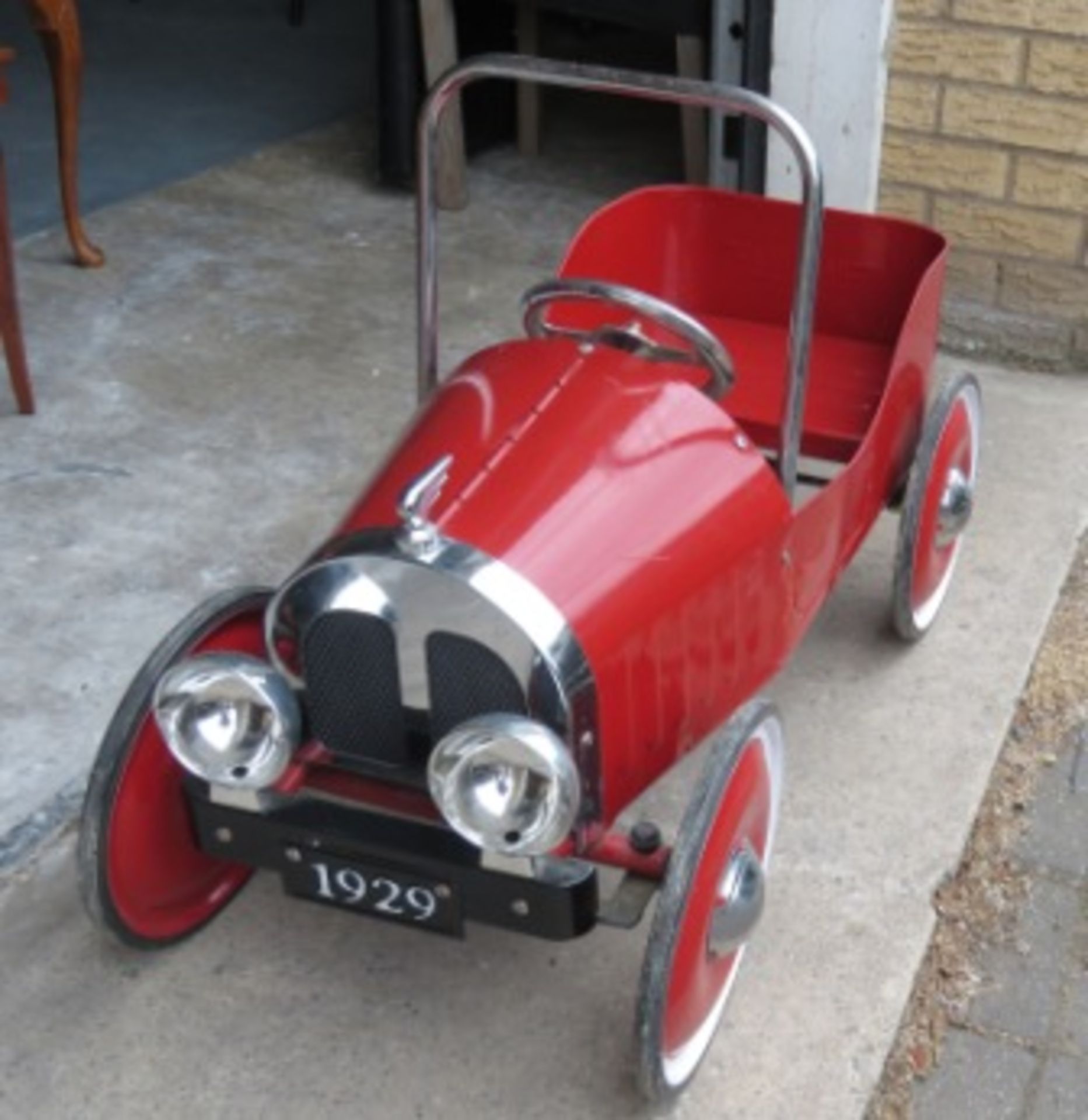 Vintage tin plate pedal car - great condition