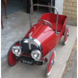 Vintage tin plate pedal car - great condition