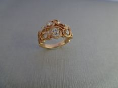 14ct rose gold open diamond dress ring. Set with graduated Brilliant cut diamonds, of H colour and