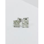 2.50ct diamond solitaire earrings ,2x1.25ct brilliant cut diamonds h colour i2(enhanced) 3gms 18ct