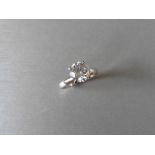 1.73ct diamond solitaire ring set in platinum. Enchanced diamond, H colour and I2 clarity. 4 claw