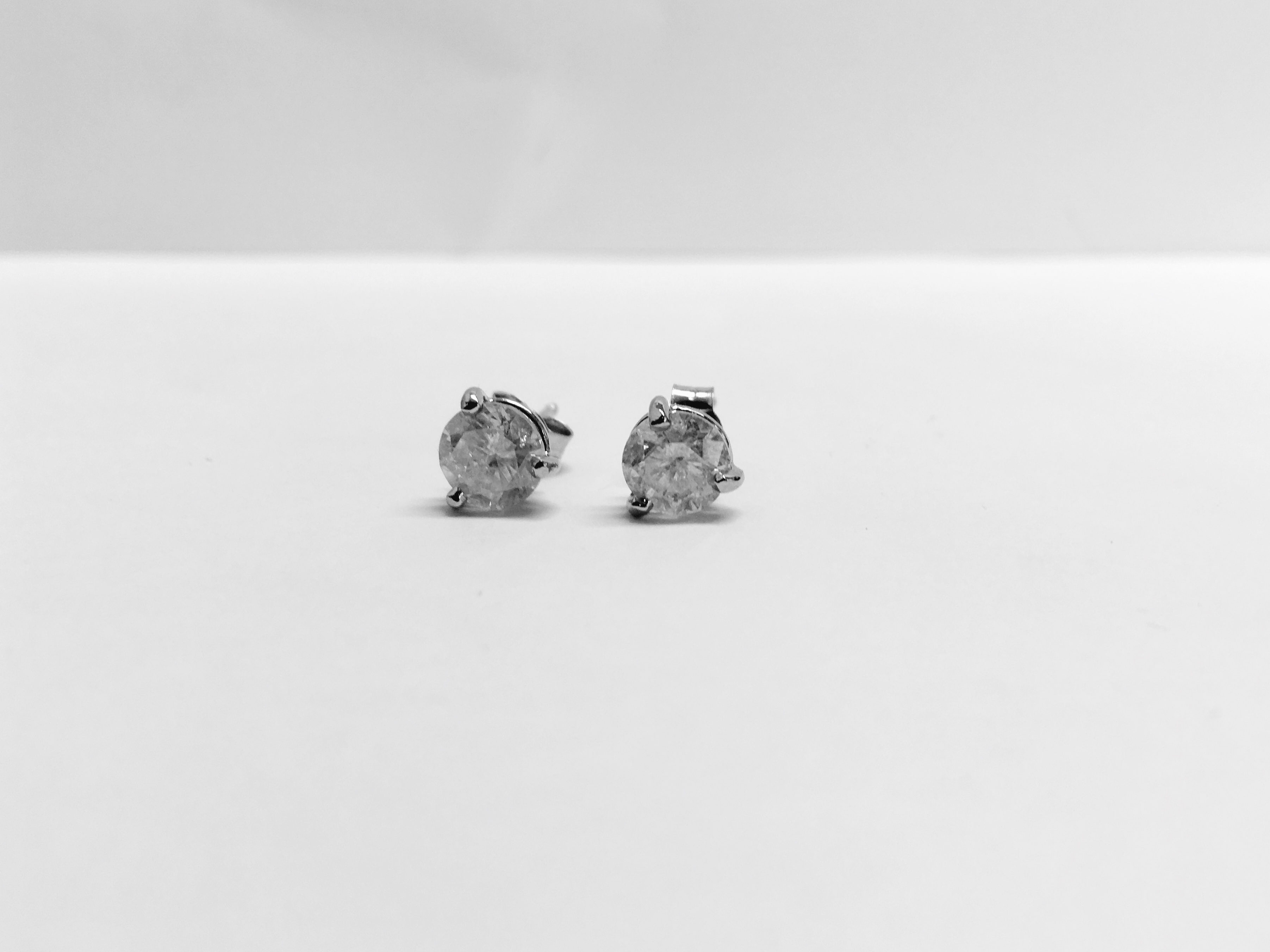 2.00ct Solitaire diamond stud earrings set with brilliant cut diamonds which have been enhanced. I - Image 4 of 4