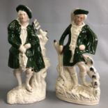 Staffordshire pair standing Scotsmen green capes bagpiper & hunter with dog 1900