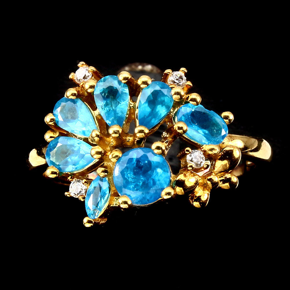 A Stunning Ring Wet With 7 Aaa Grade Natural Pear Cut Neon Blue Apatite Gemstones - Clarity Vvs/If