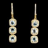 An Exquisite Pair Of Earrings Set With 6 Natural Blue Topaz Gemstones - Clarity If