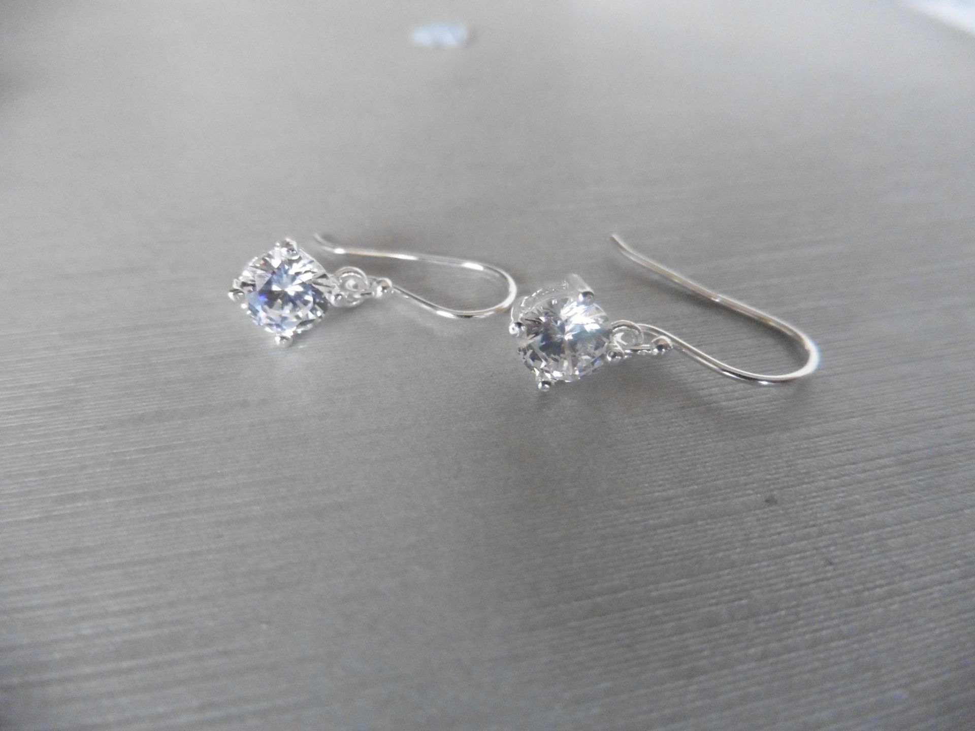 0.80ct diamond drop style solitaire earrings each set with a brilliant cut diamond, I colour, Si2 - Image 3 of 3