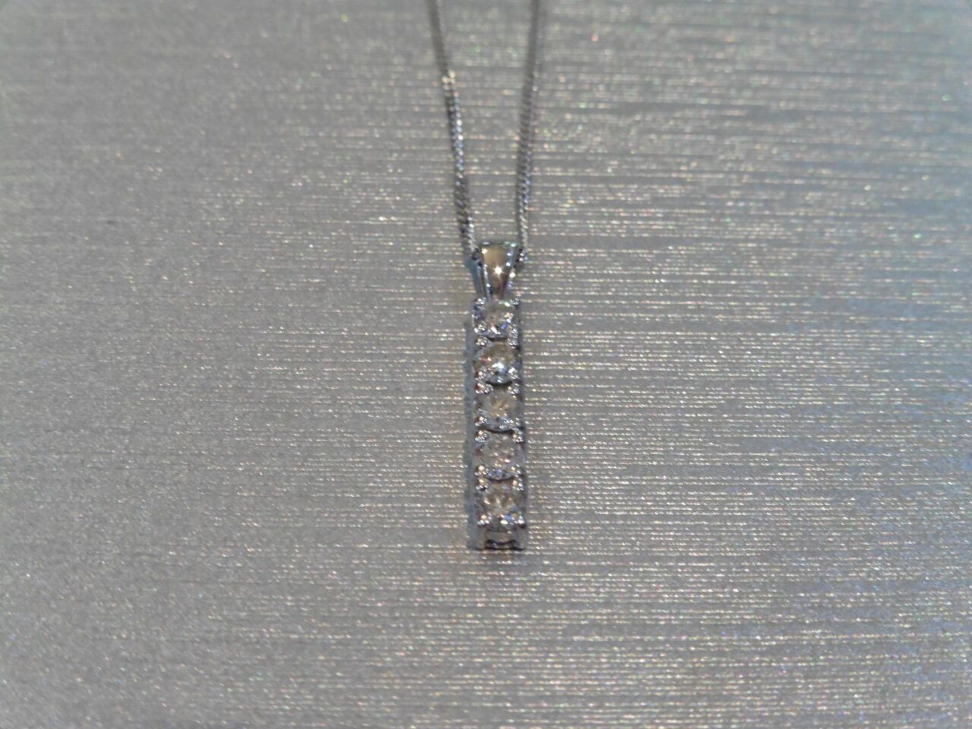 0.50ct diamond drop pendant in 18ct white gold. Brilliant cut diamonds, 0.10ct each, H/I colourand
