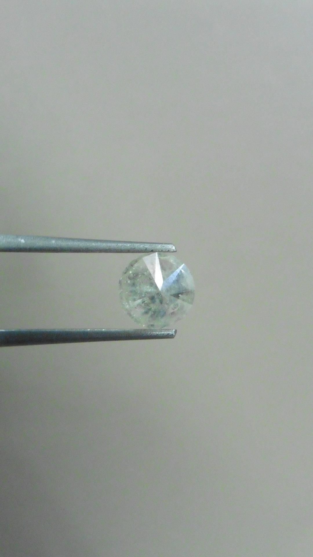 1.34ct Brilliant Cut Diamond, Enhanced stone. I colour, I2 clarity. . Valued at £1650