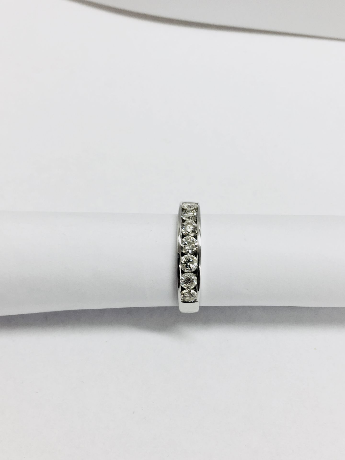 0.70ct diamond eternity style band ring. Set with 7 brilliant cut diamonds, I, si3 clarity. - Image 3 of 4