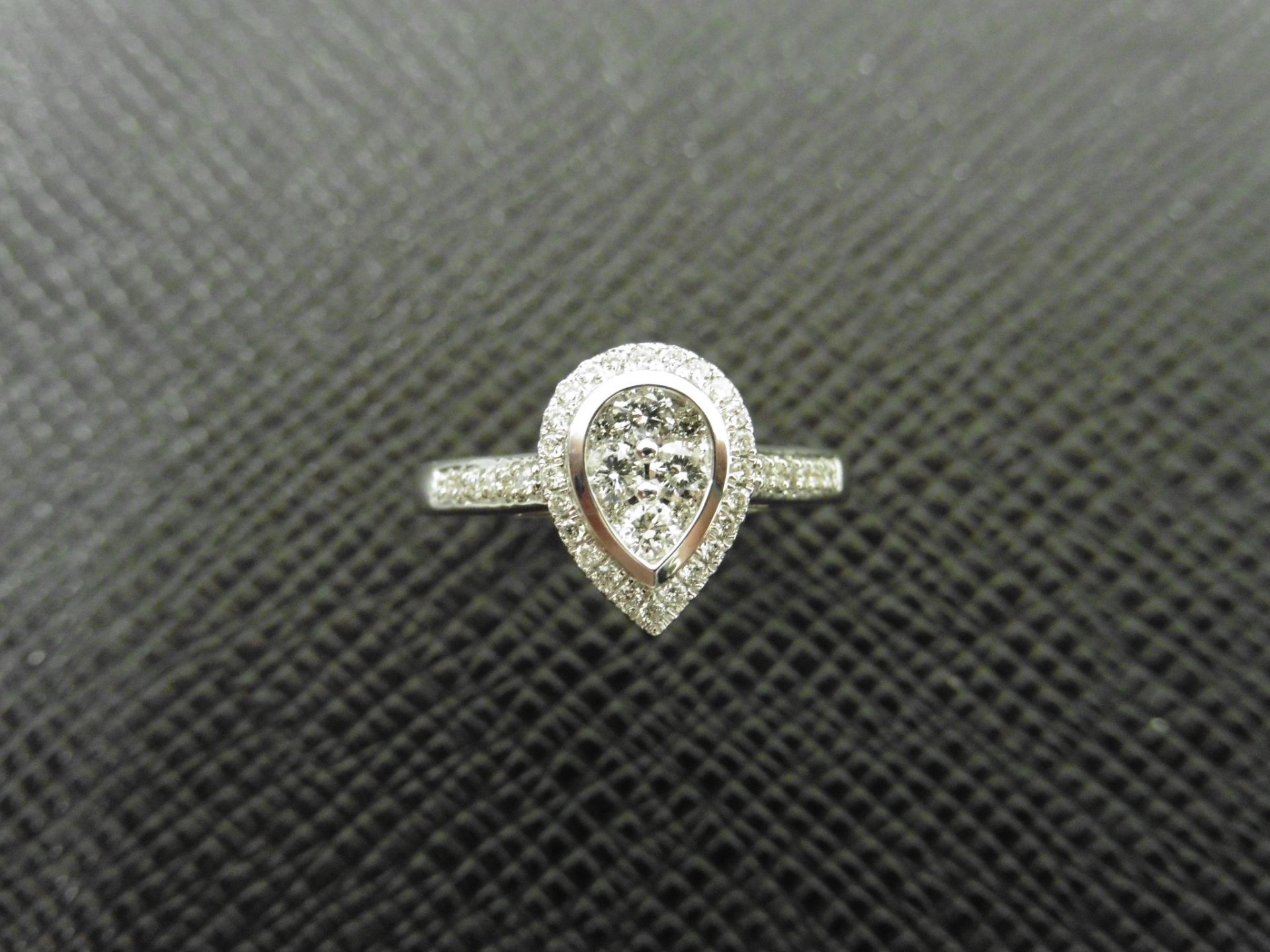0.33ct diamond set solitaire style ring. Pear shape setting with small round cut diamonds, H - Image 4 of 4