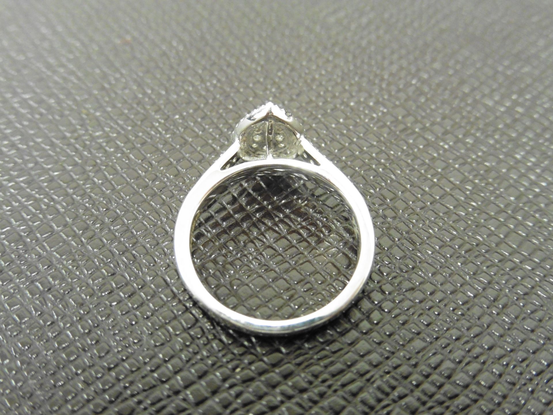 0.33ct diamond set solitaire style ring. Pear shape setting with small round cut diamonds, H - Image 2 of 4