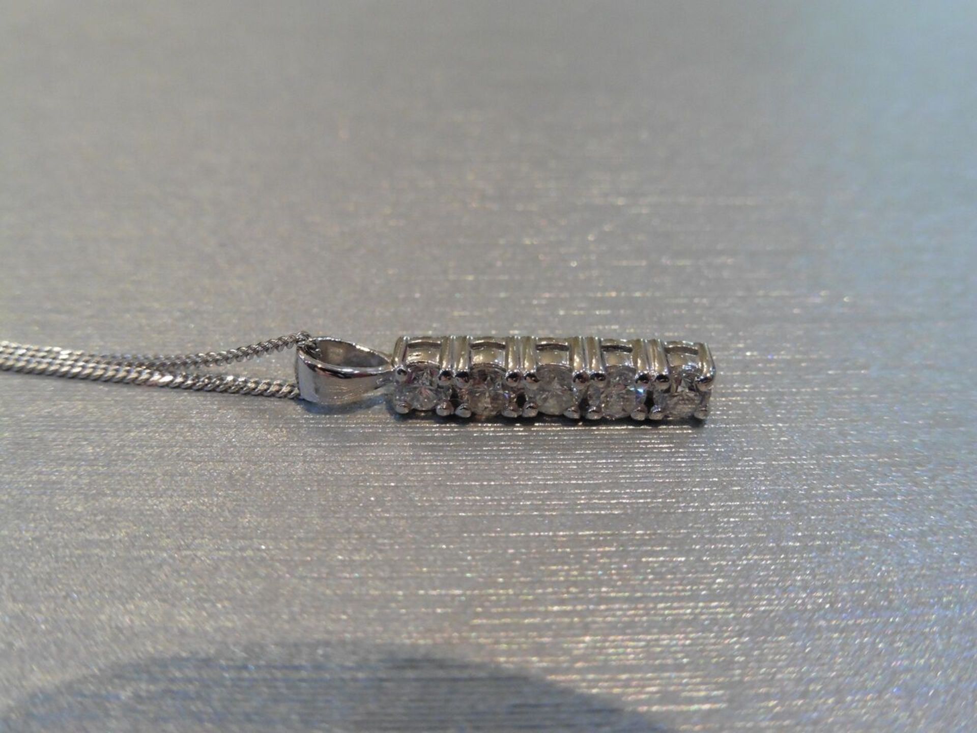 0.50ct diamond drop pendant in 18ct white gold. Brilliant cut diamonds, 0.10ct each, H/I colourand - Image 3 of 3