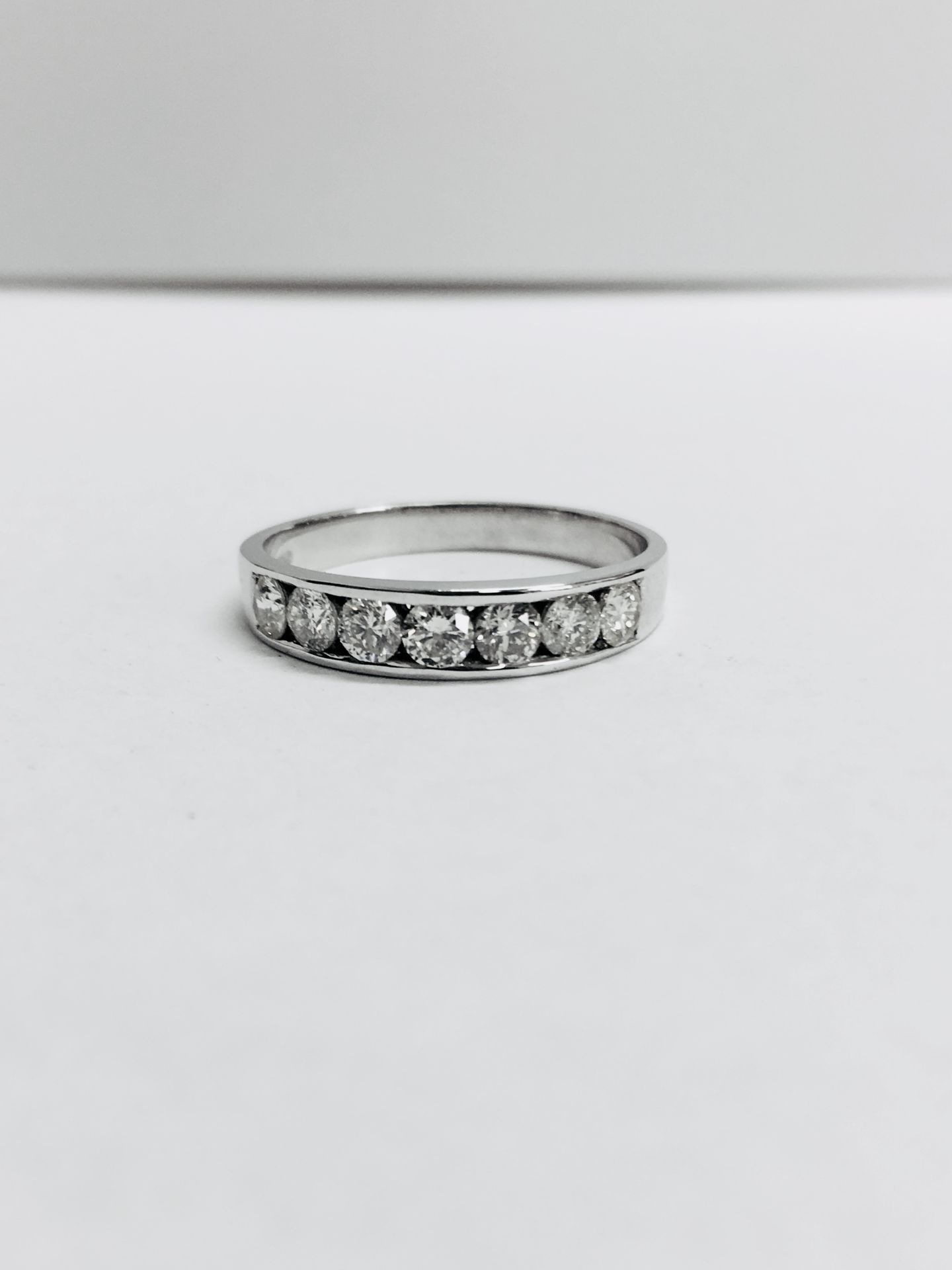 0.70ct diamond eternity style band ring. Set with 7 brilliant cut diamonds, I, si3 clarity. - Image 2 of 4