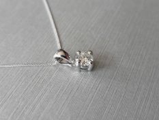0.20ct diamond solitaire pendant set in 18ct gold. 4 claw setting, plain bale. I colour and si3
