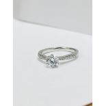 Platinum diamond solitaire ring,050ct brilliant cut diamond h colour vs clarity(clarity enhanced),