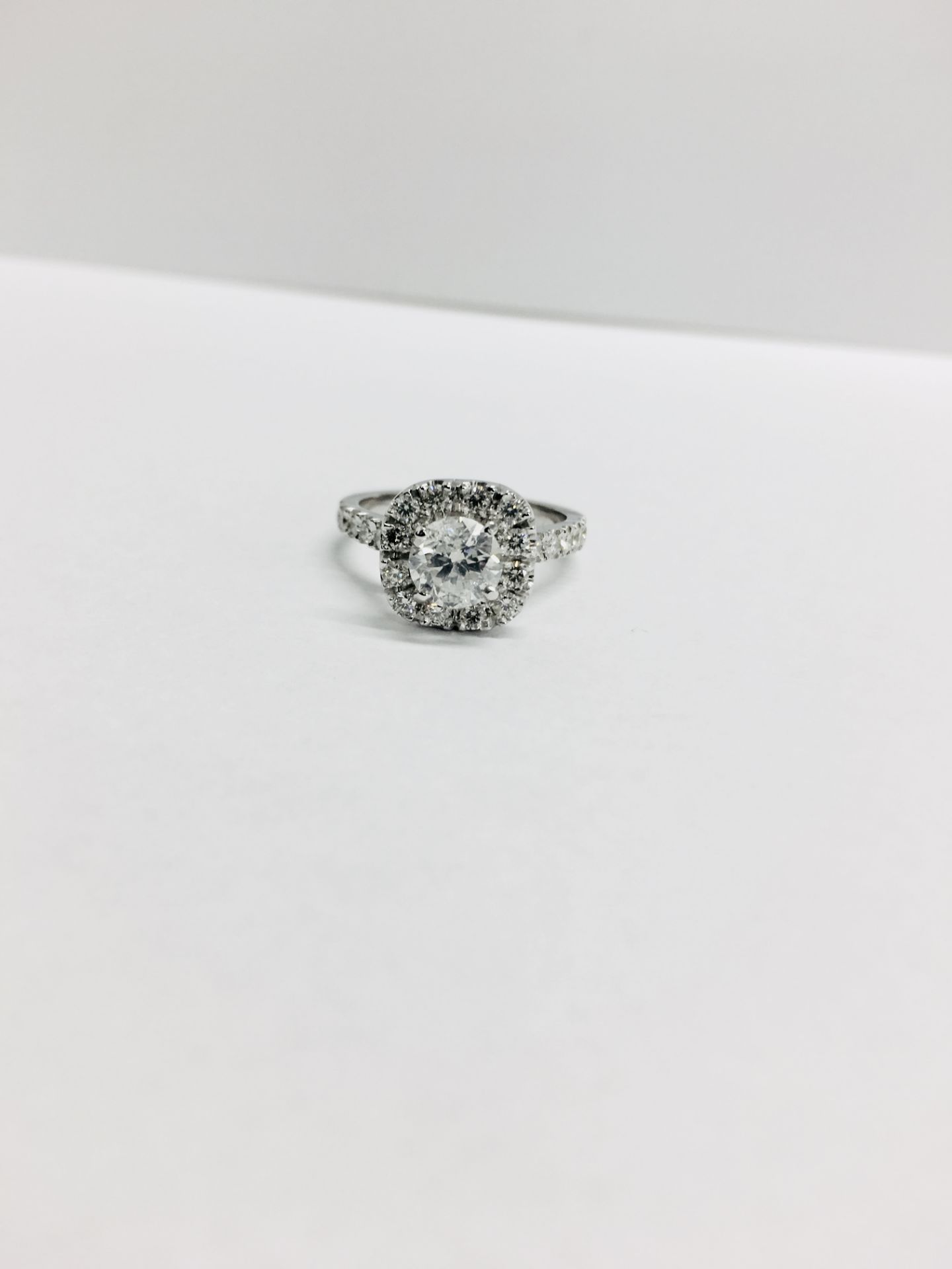 18ct white gold Halo style Diamond ring,0.50ct brilliant cut centre,h colour vs clarity,0.25ct