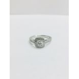 9ct white gold Diamond Halo solitaire ring,0.30ct centre h colour is grade,0.18ct h colour is