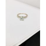 18ct Rosegold diamond solitaire ring,0.75ct Brilliant cut diamond,0.15ct brilliant cut diamonds