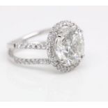 18ct White Gold Single Stone With Halo Setting Ring 9.00