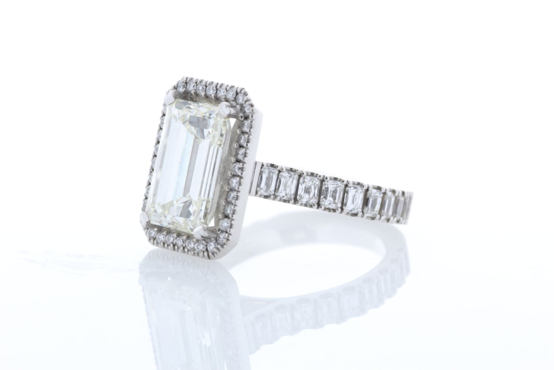 18ct White Gold Single Stone Emerald Cut With Halo Setting Ring 5.00
