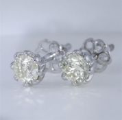 14 K/ 585 White Gold Solitaire Diamond Earrings