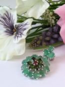 An Amazing AGI Certified very unique Brooch set with 15 Natural Brazilian Emerald Gemstones