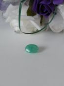 AGI Certified £13,380.00 A Fantastic Oval Cabochon 6.69 Carat Colombian Emerald. A Natural Emerald