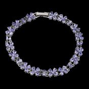 An Amazing Bracelet set with - 74 natural Tanzanite gemstones.