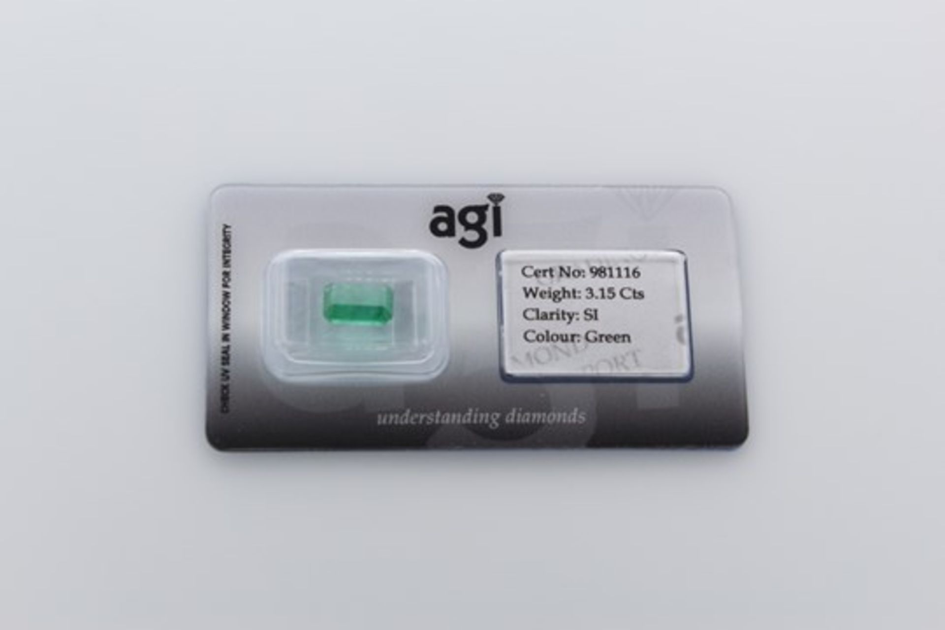 AGI Capsulated Green Emerald, Weight- 3.15 Carat