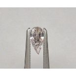 An unmounted Pear-shaped diamond weighing app. 0.37ct. Colour : Pink .Clarity :I1