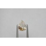 An unmounted Pear-shaped diamond weighing app. 0.76ct. Colour : Brown .Clarity :SI2