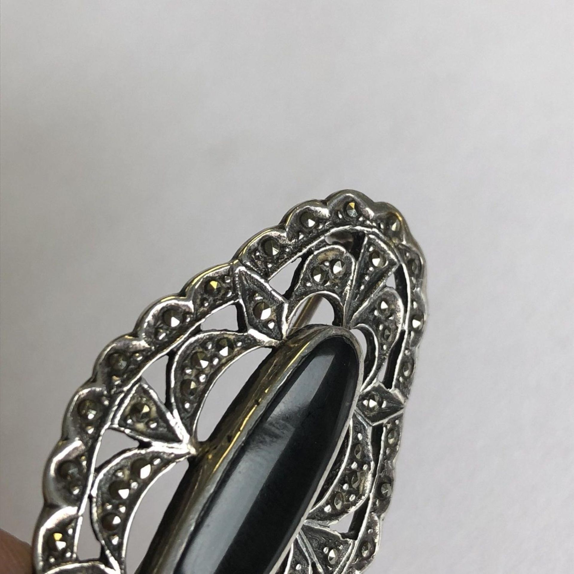 Hallmarked Silver, Marcasite and black stone brooch - Image 3 of 3