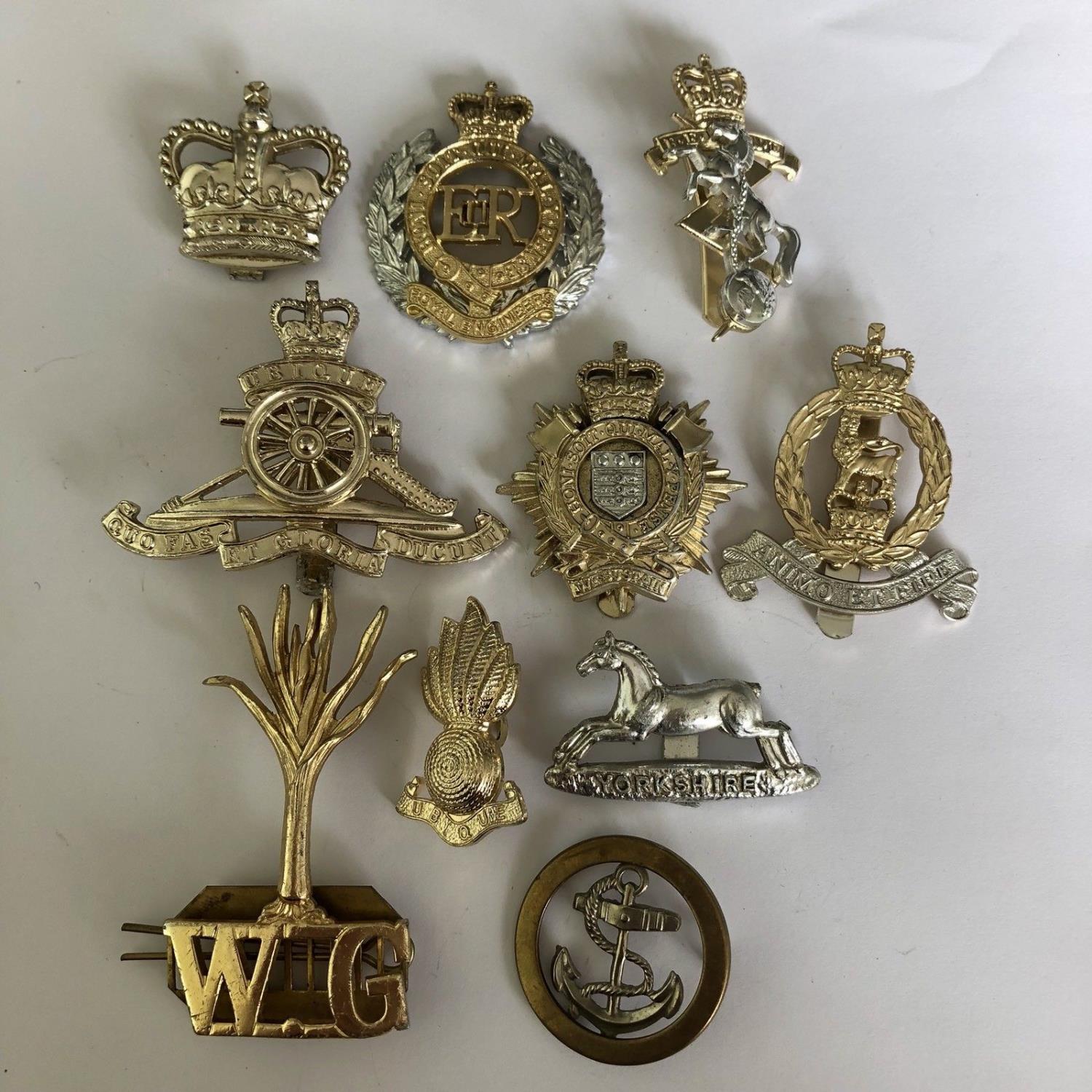 Group of 10 British military cap badges