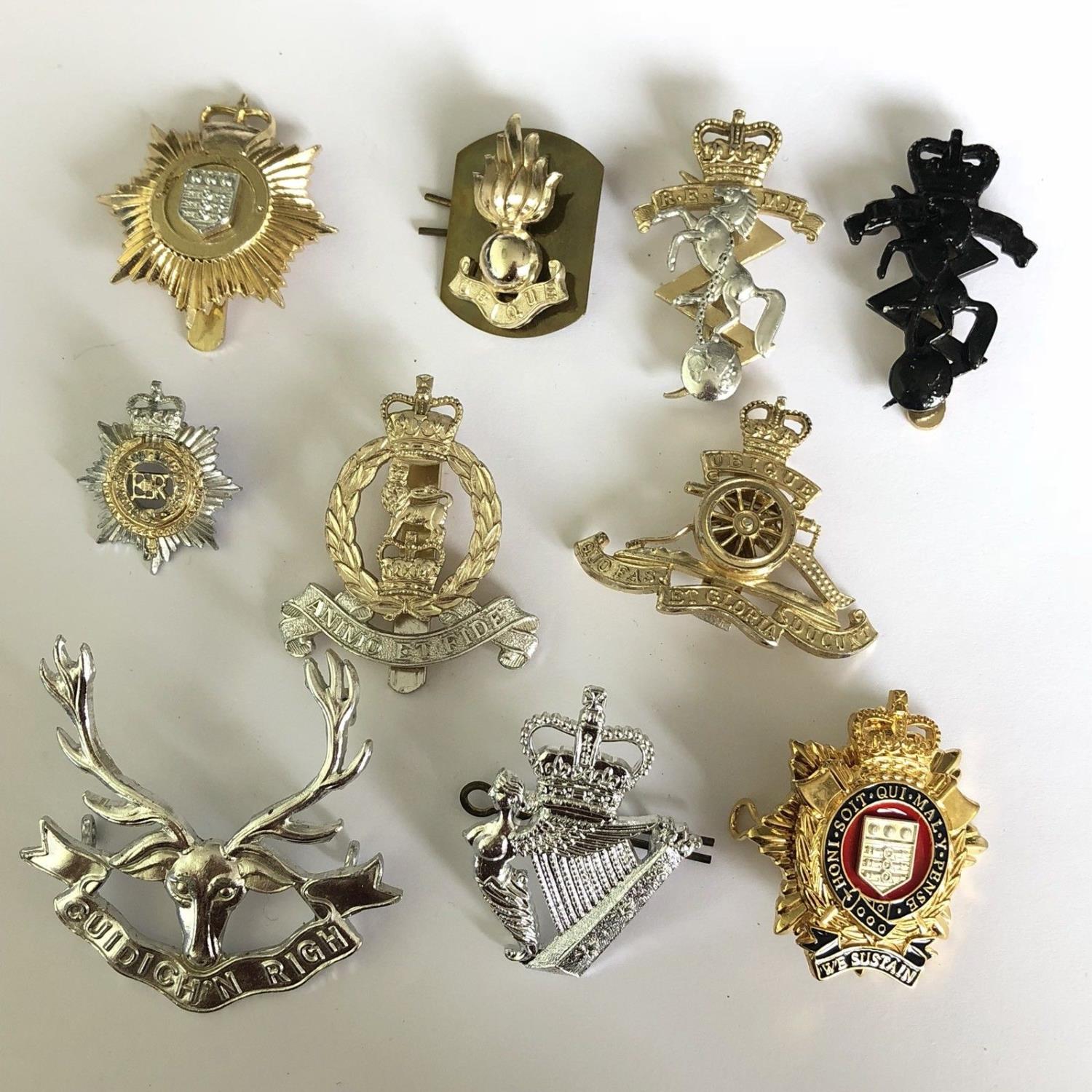 Group of 10 British military cap badges