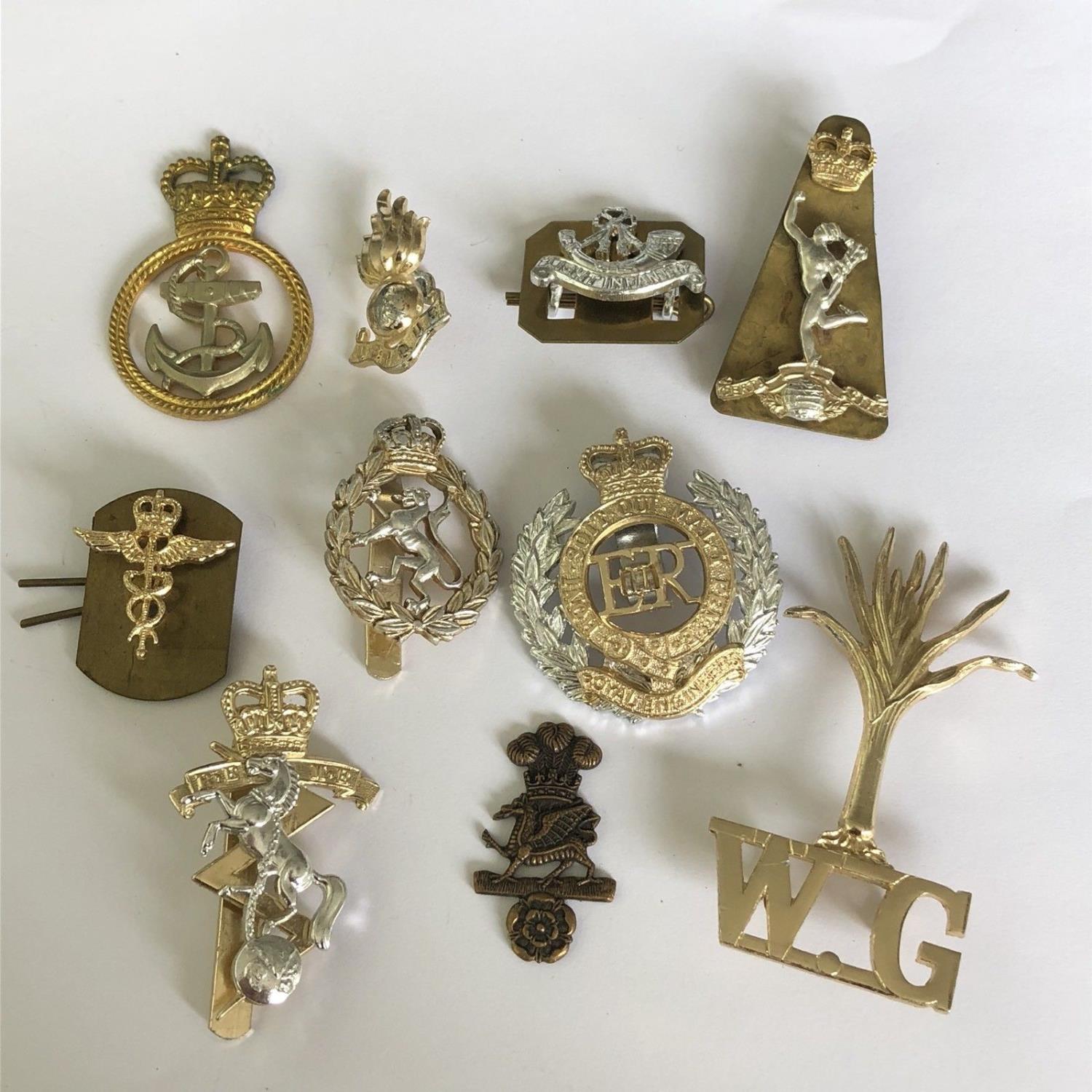 Group of 10 British military cap badges