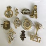 Group of 10 British military cap badges