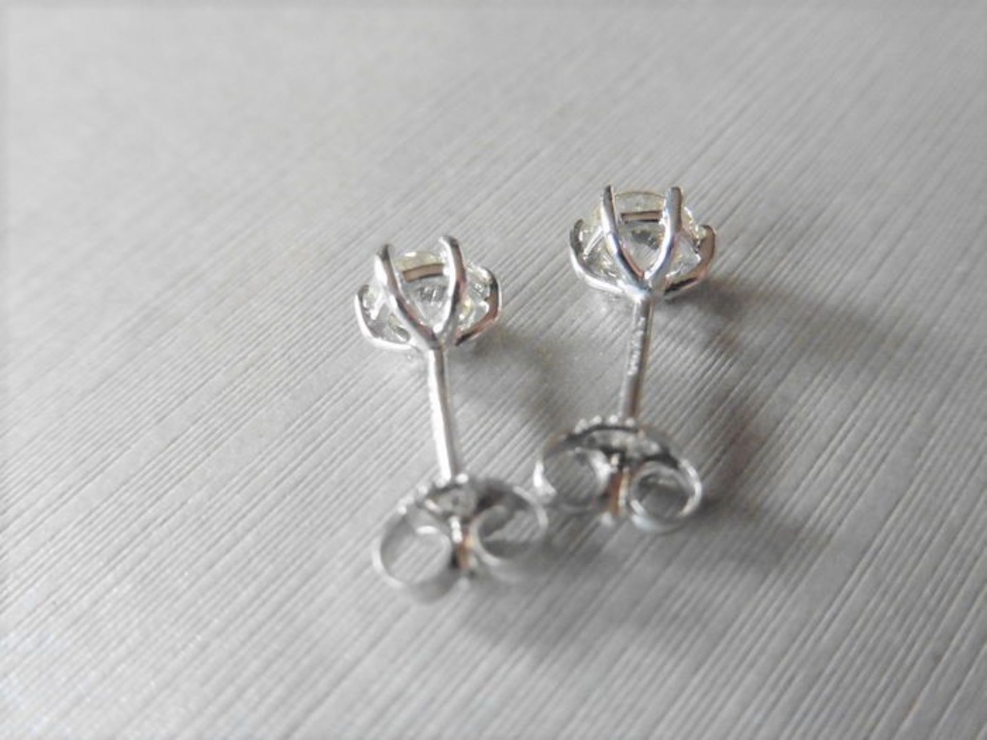 1.90ct Diamond set solitaire style earrings. Each set with a brilliant cut diamond, J colour, i1 - Image 2 of 2