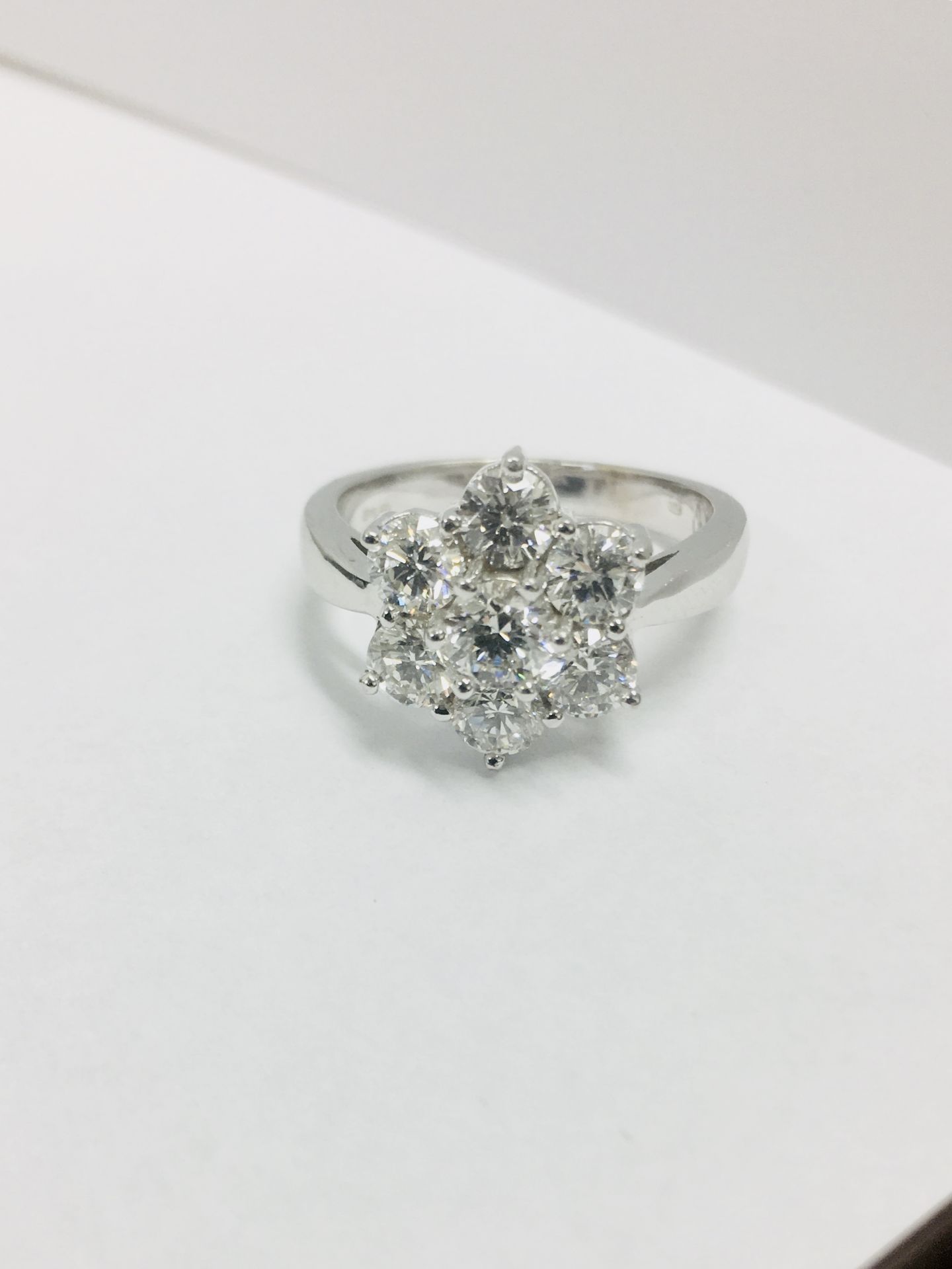 2.25ct diamond cluster style dress ring. 7 Brilliant cut diamonds, I colour and si2-3 clarity.