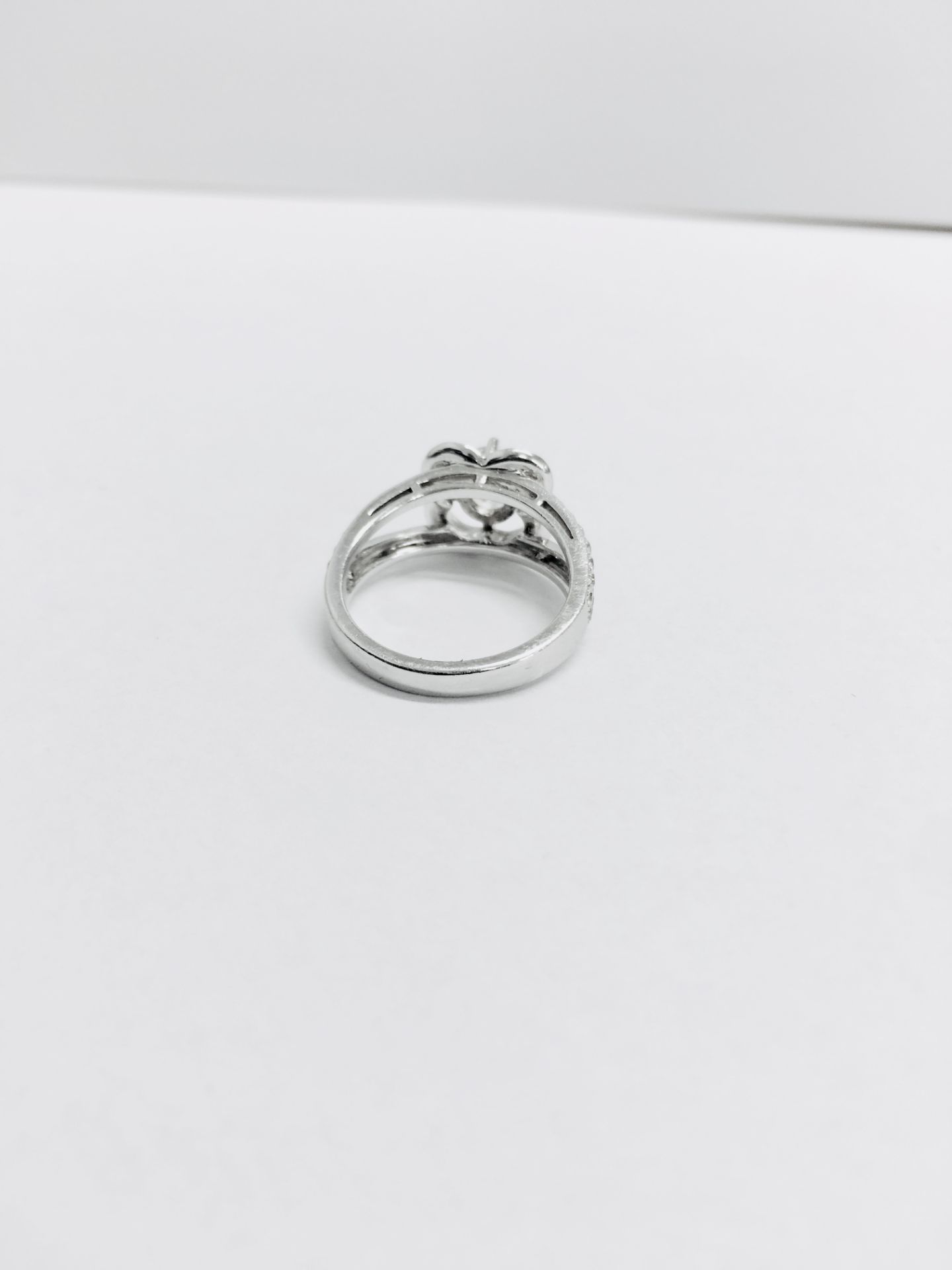 1.04ct diamond set soliatire ring in platinum. H colour and I1 clarity. Halo setting small - Image 3 of 4