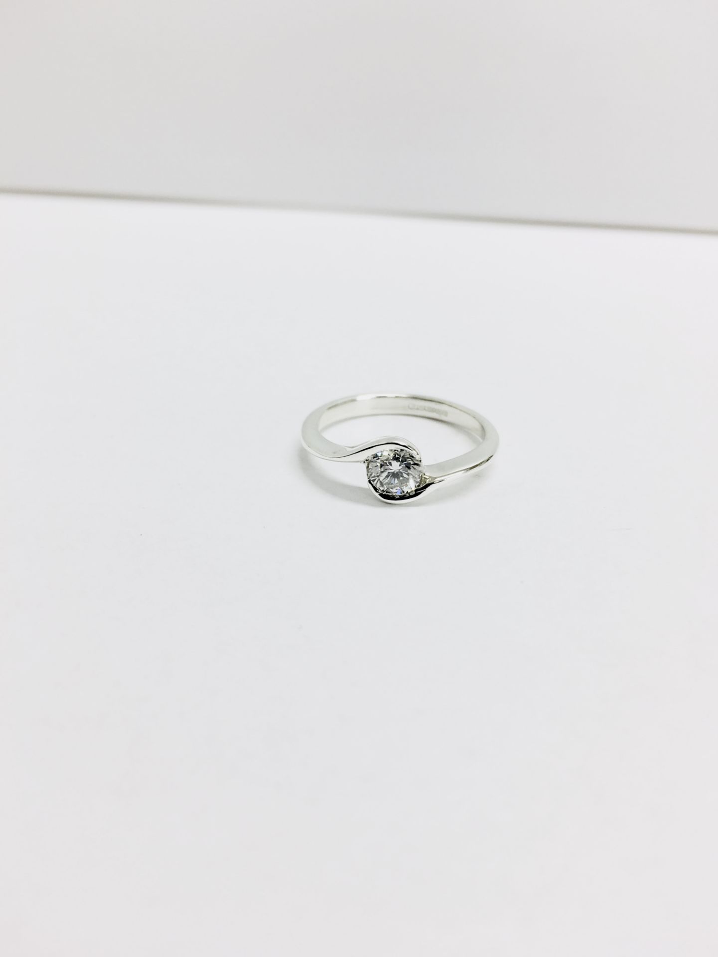 platinum diamond twist style ring,0.50ct E colour vvs2 clarity ,5.89gms platinum,uk size K,uk