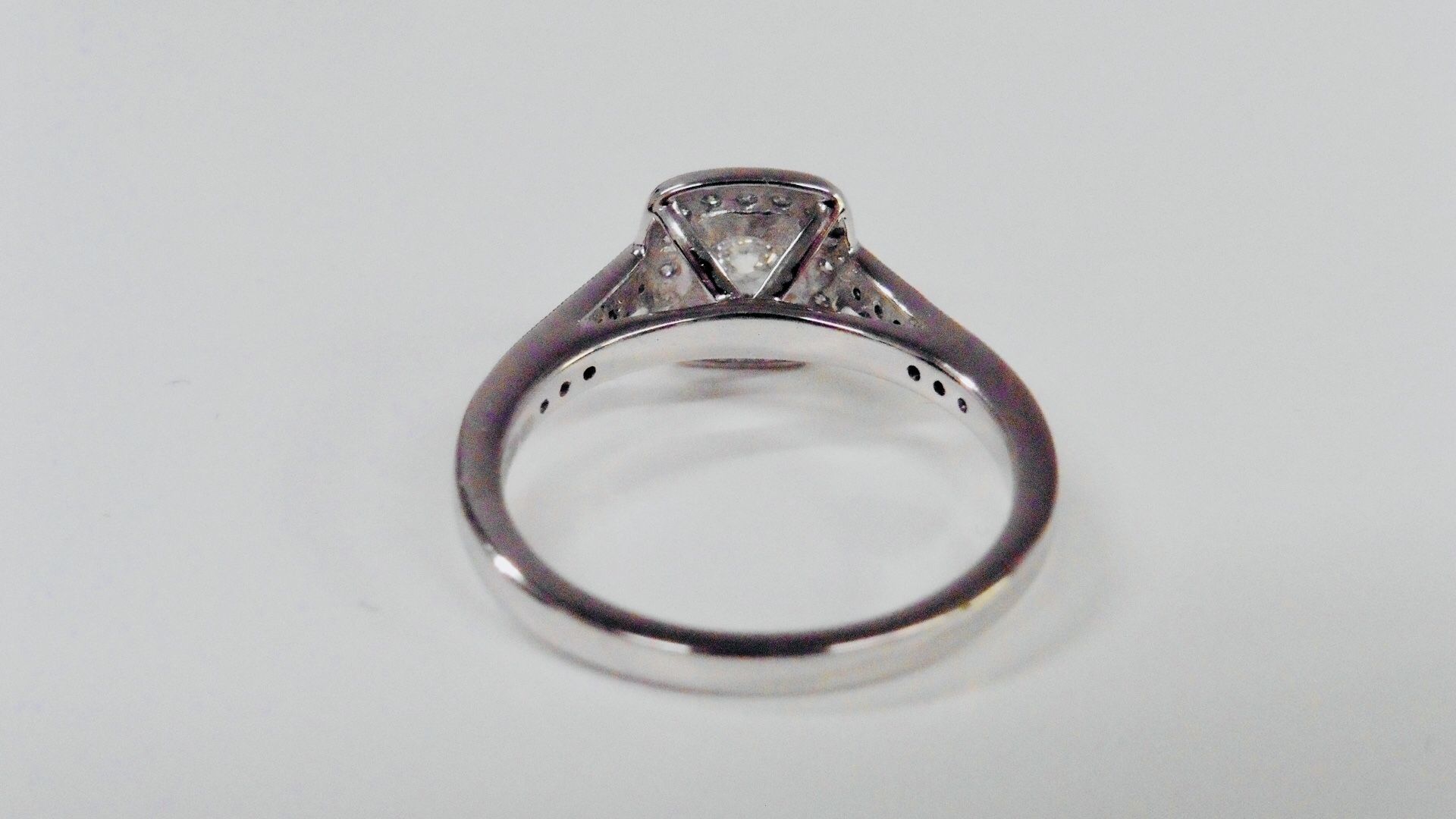 9ct DiaMond Halo solitaire ring,050ct D colour vs clarity brilliant cut diamond,0.18ct h colour is - Image 4 of 4