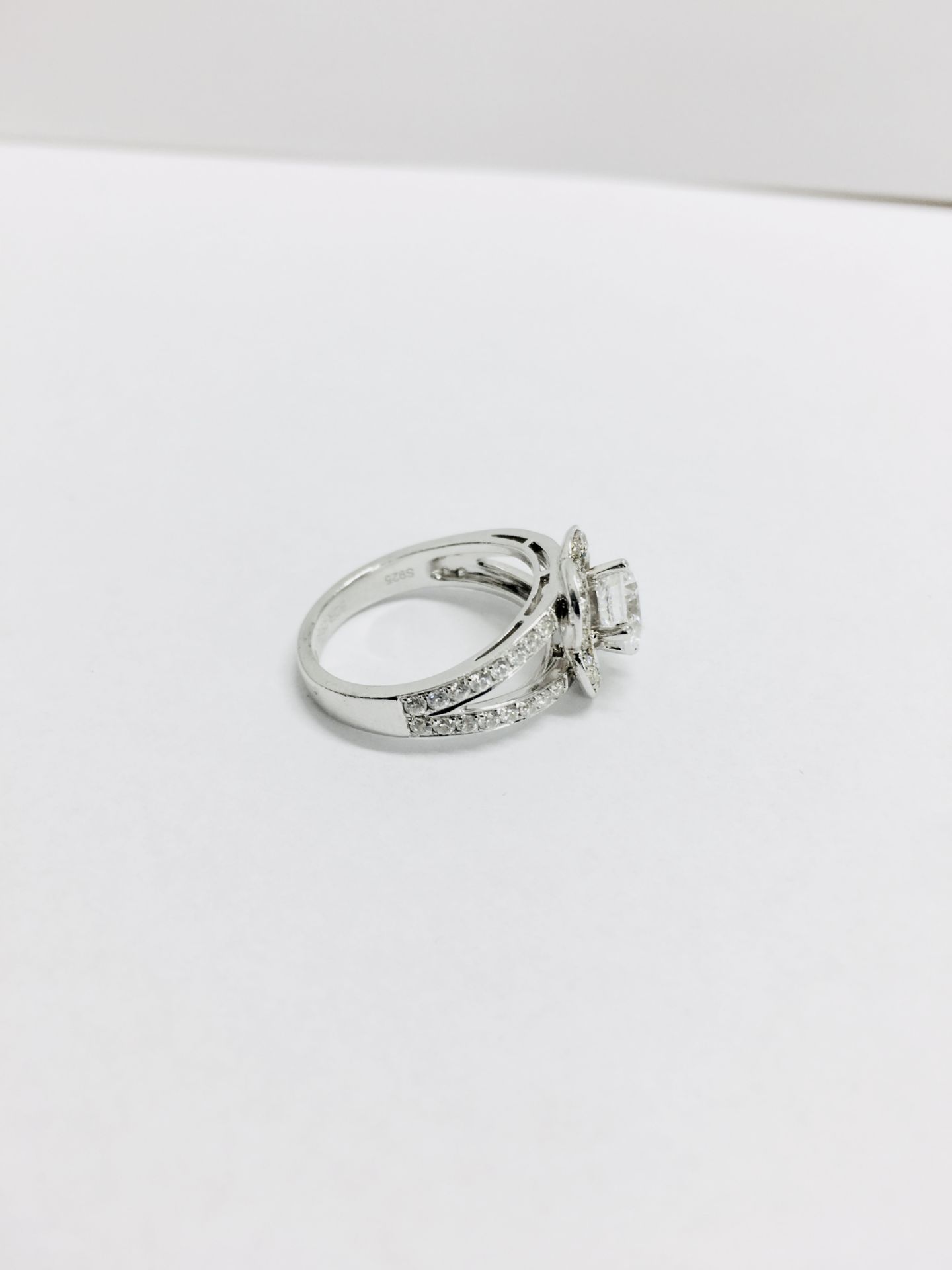 1.04ct diamond set soliatire ring in platinum. H colour and I1 clarity. Halo setting small - Bild 4 aus 4