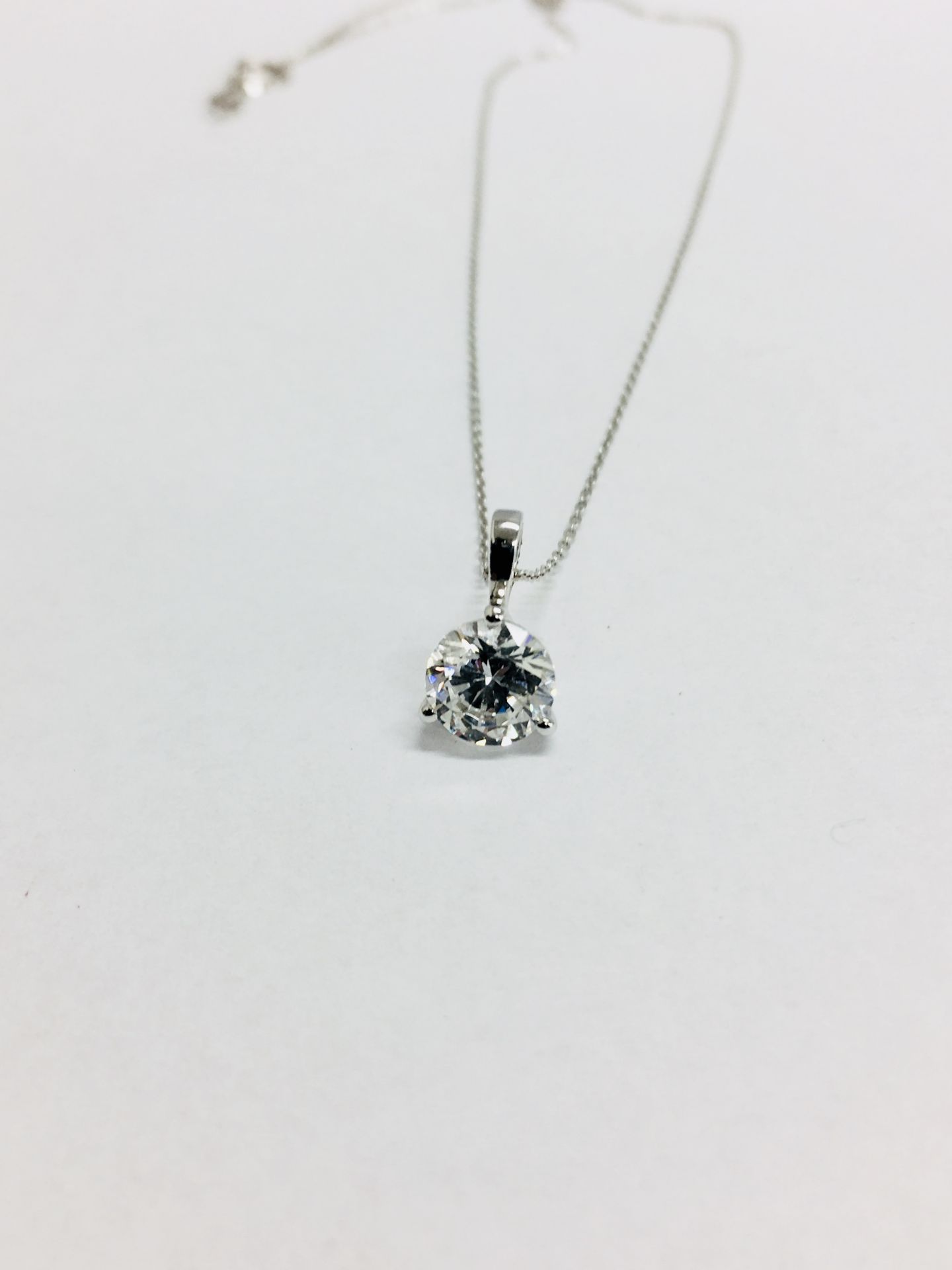 1.00ct diamond solitaire pendant set in a platinum 3 claw setting. H colour and Si2 clarity. 9ct - Image 3 of 3