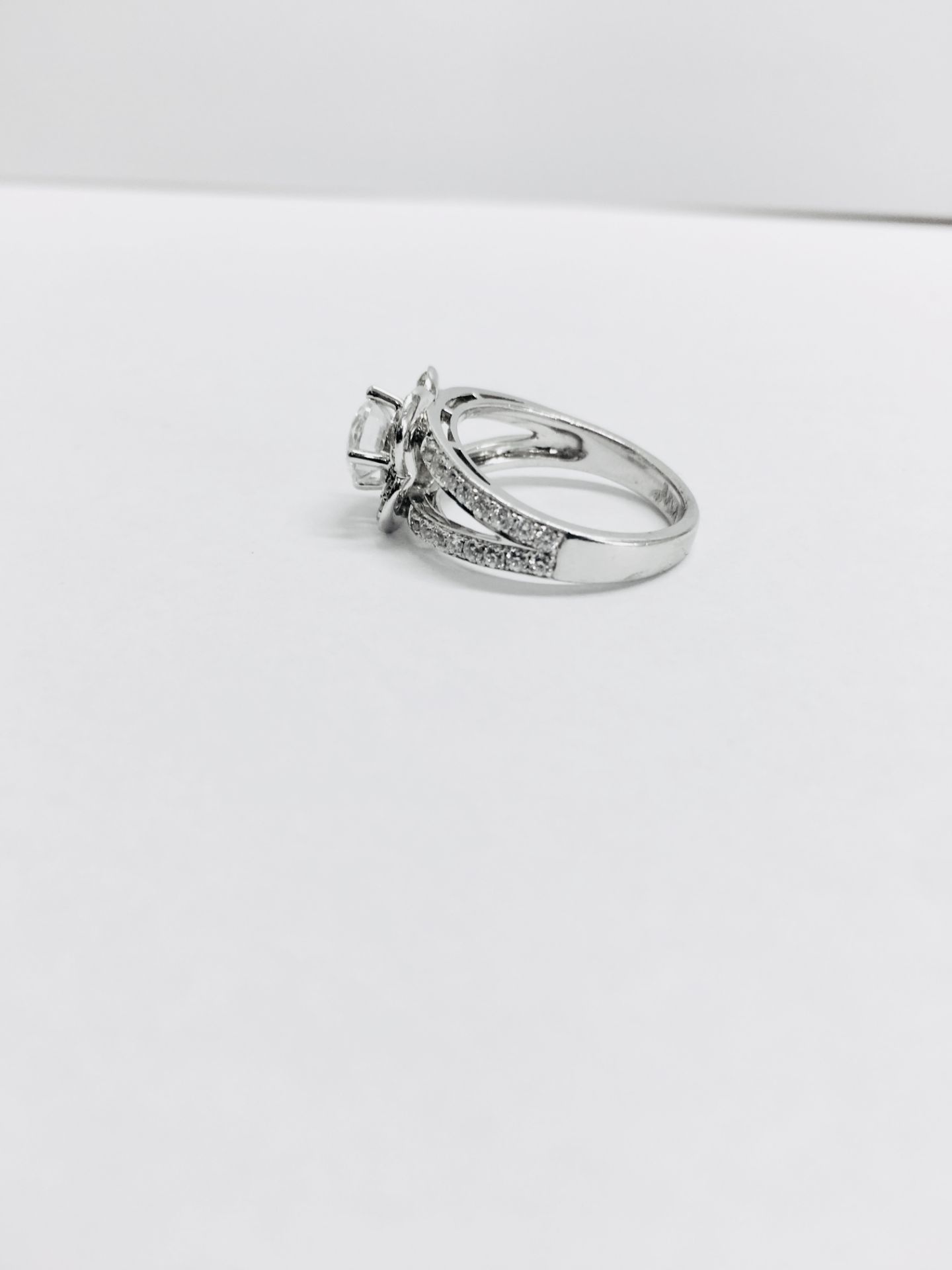1.04ct diamond set soliatire ring in platinum. H colour and I1 clarity. Halo setting small - Image 2 of 4