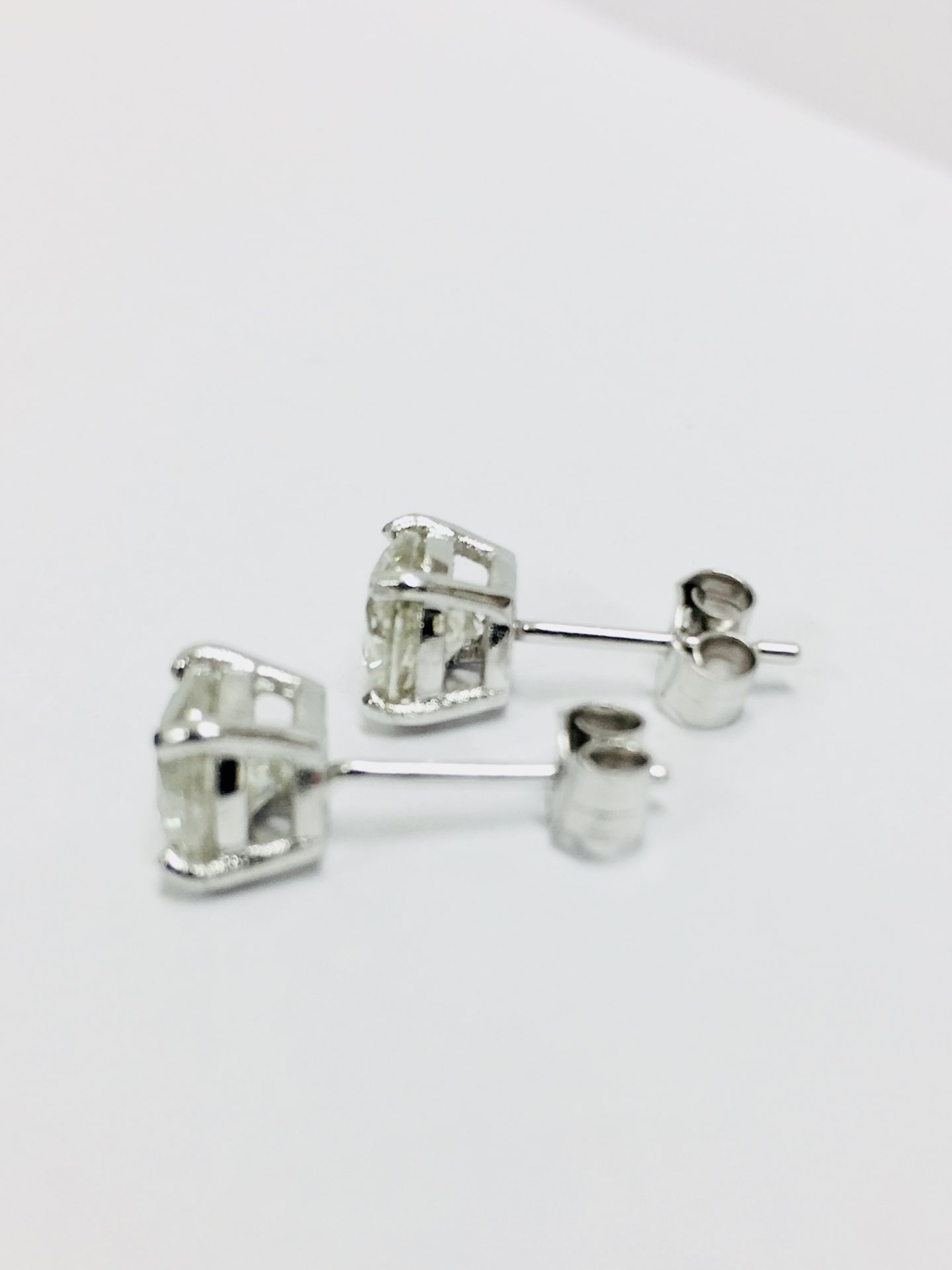 2.00ct Solitaire diamond stud earrings set with brilliant cut diamonds which have been enhanced. J - Image 3 of 4