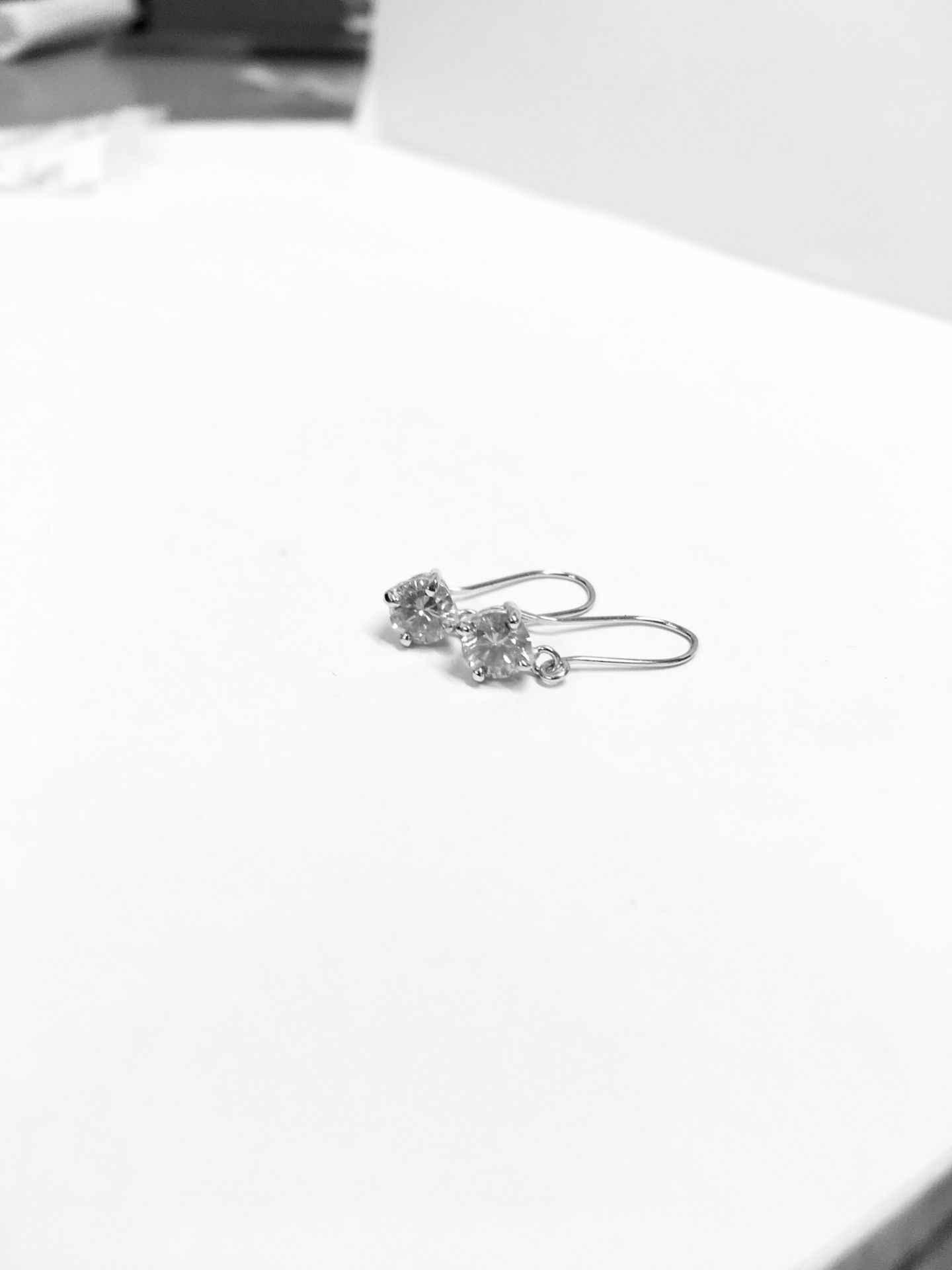 1.00ct drop earrings ,2x 0.50ct diamonds i colour i1 quality ,2.6 gms 18ct white.