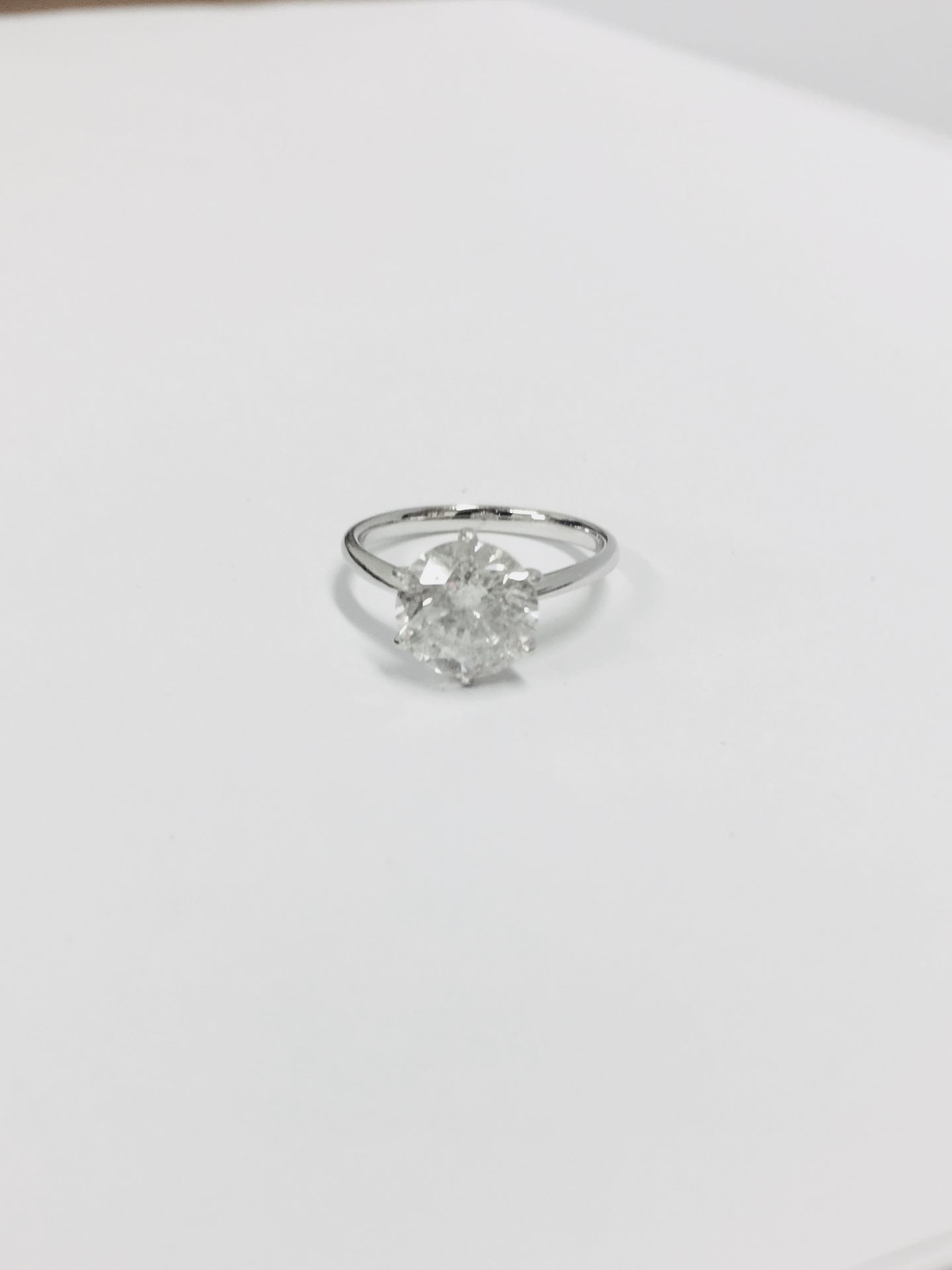 3.01ct brilliant cut natural diamond, I2 clarity I colour(clarity enhanced) ,platinum 6 claw