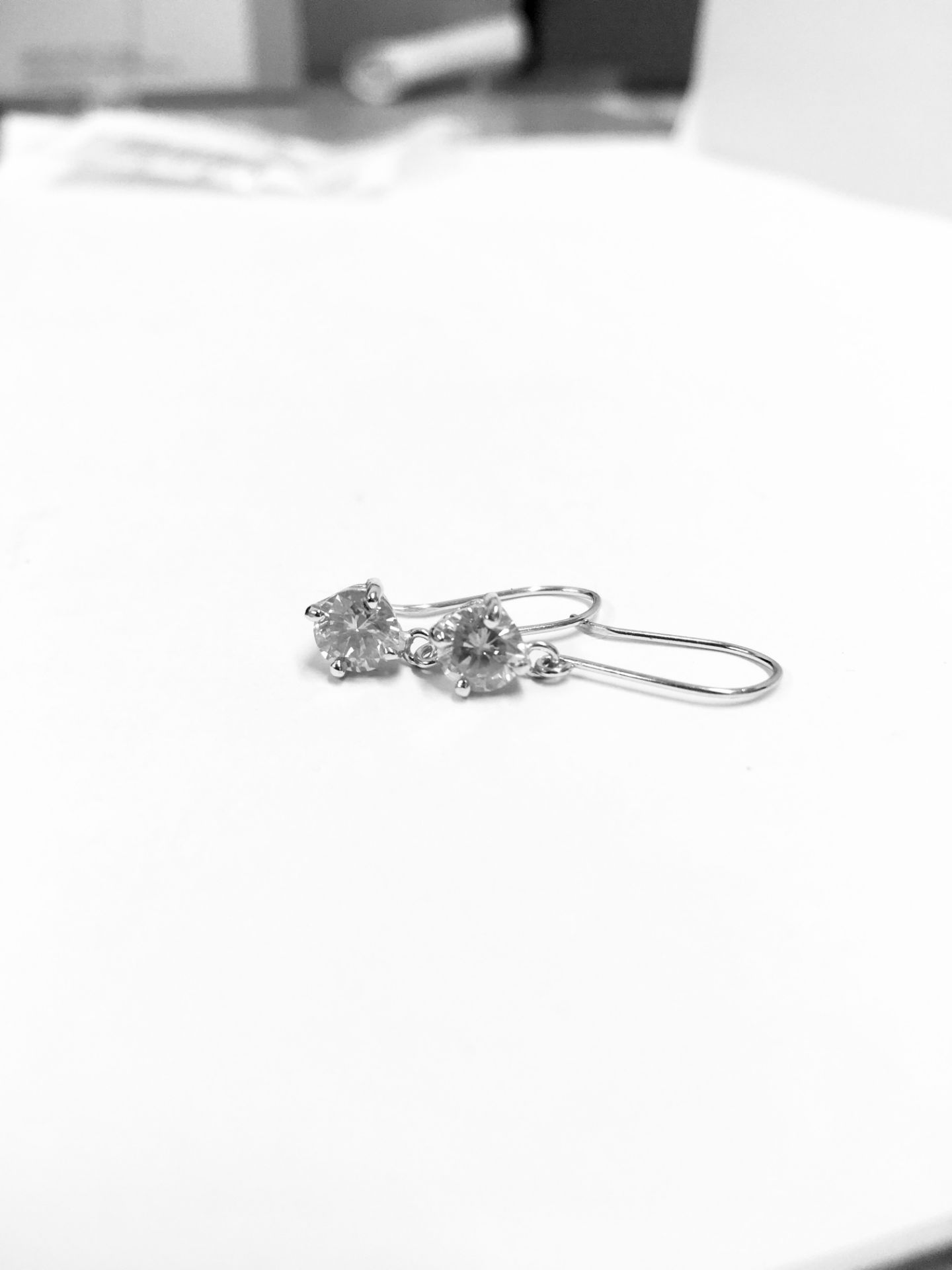 1.00ct drop earrings ,2x 0.50ct diamonds i colour i1 quality ,2.6 gms 18ct white. - Image 2 of 6