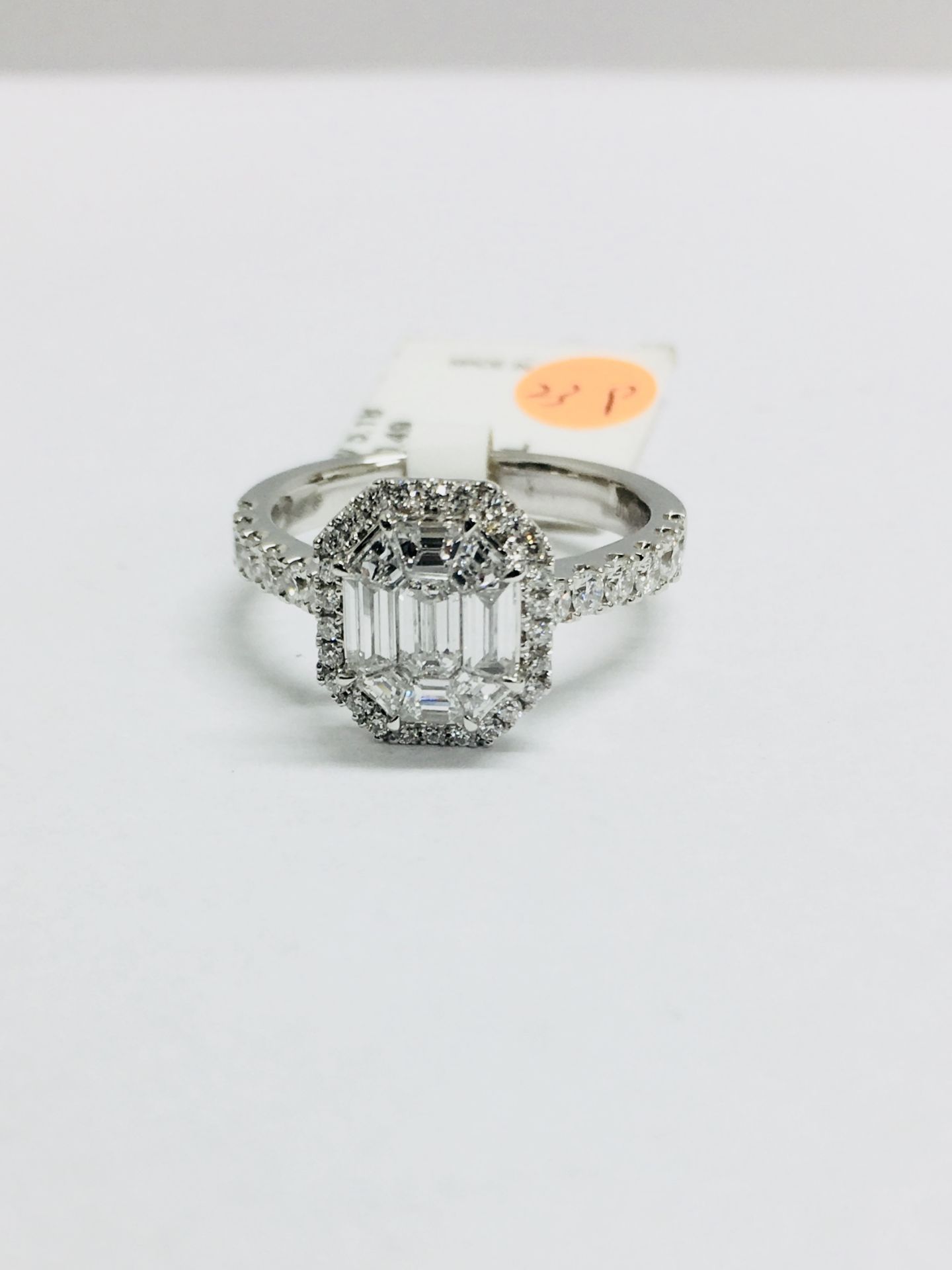 18ct fancy halo diamond ring,8 taper baguette 0.86ct h colour vs clarity,38x round diamond h